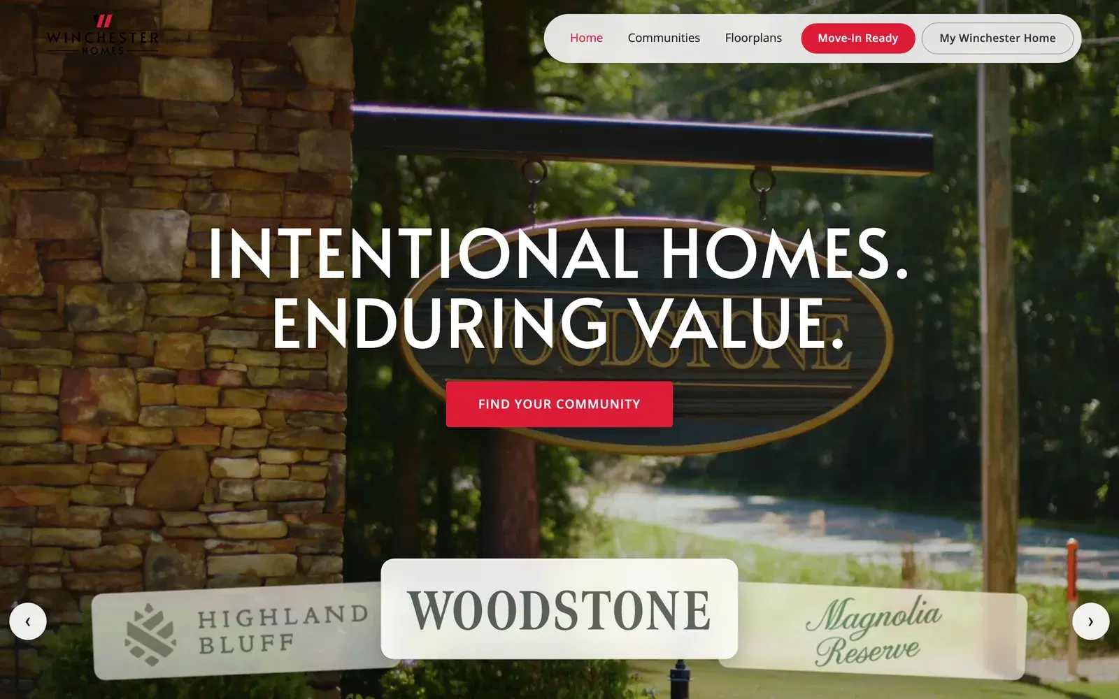 The Winchester Homes homepage, showing the Woodstone community entrance and a community selector.